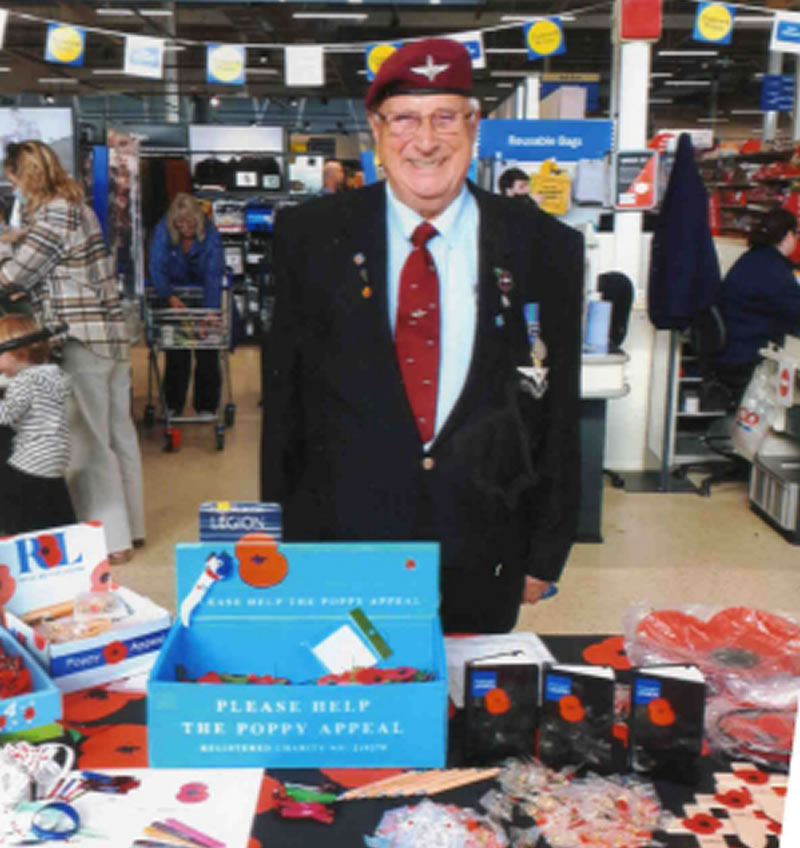  ﻿Rotarian Bryan Hunter, ex paratrooper,<br />
collecting for the British Legion at Tesco, Hastings.
