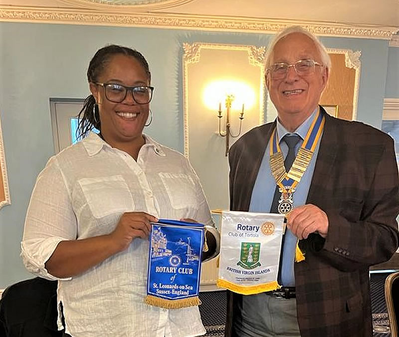 Vice President Abby from the Rotary Club of Tortola and President Bryan.
