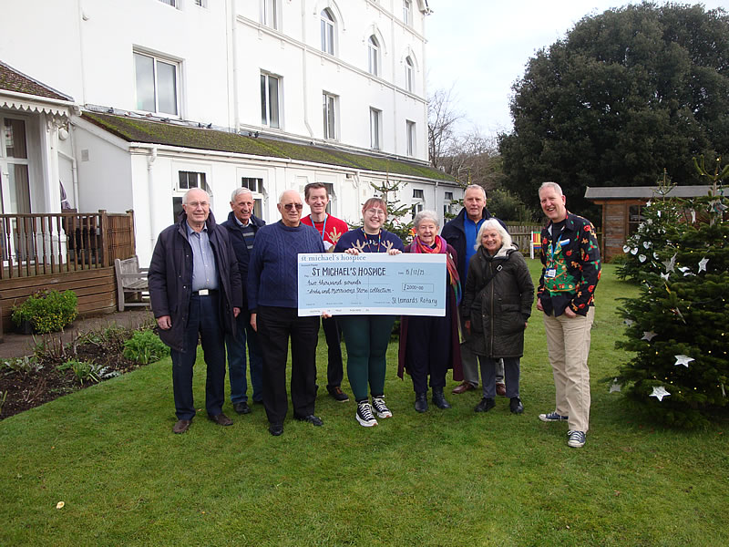 Some club members and staff at presentation of cheque for £2,000 to St Michael’s Hospice on 14th December following the Collections at both Asda and Morrisons earlier in the month.